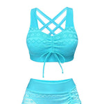 Turquoise crochet bikini with crisscross back straps, tie-front top, and ruffle skirt