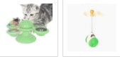 Cat rotating windmill toy with green base and hanging ball on a long cord