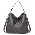 Dark gray hobo bucket bag with top zipper and dual shoulder straps