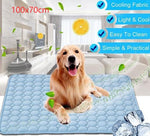 Blue cooling pad with pebble quilt texture; golden dog lying on the mat