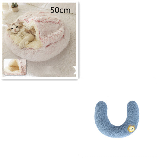 Half-moon plush bolster with blue fabric and small smiley patch