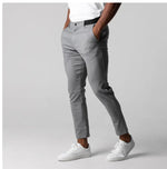 Light gray slim-fit trousers with elastic waistband, button closure, straight leg