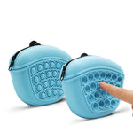 Pair of blue silicone dog treat pouches with circular popper front and black zip pull