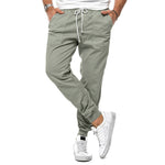 Men's drawstring ankle-cuff sports trousers, muted green, loose tapered fit