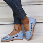 Light blue perforated women's wedge sandals with round toe and sling strap