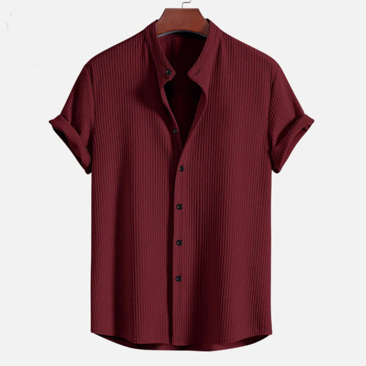 Wine red short sleeve button-up shirt with pointed collar and vertical textured fabric