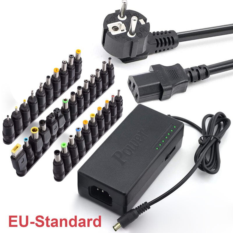 Universal power adapter with EU-style plug, multiple DC tips, and LED indicator lights