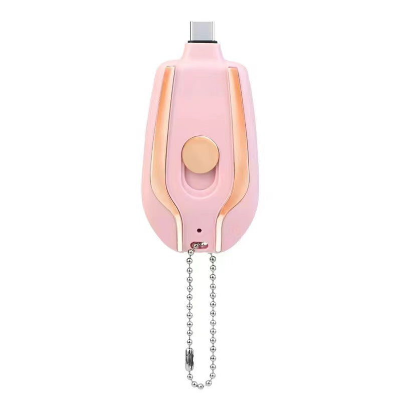 Pink keychain power pod charger with USB-C port and bead chain, round front button