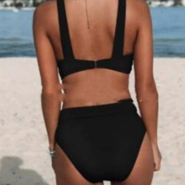 Black backless bikini with adjustable shoulder straps and high-rise coverage bottoms.