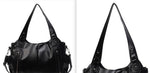 Women’s retro PU handbag, black, side view with top handles and shoulder strap details.