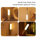 Portable LED night light with hanging loop and glowing panel, gray body