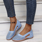 Light blue perforated women's wedge sandals with round toe and cross strap