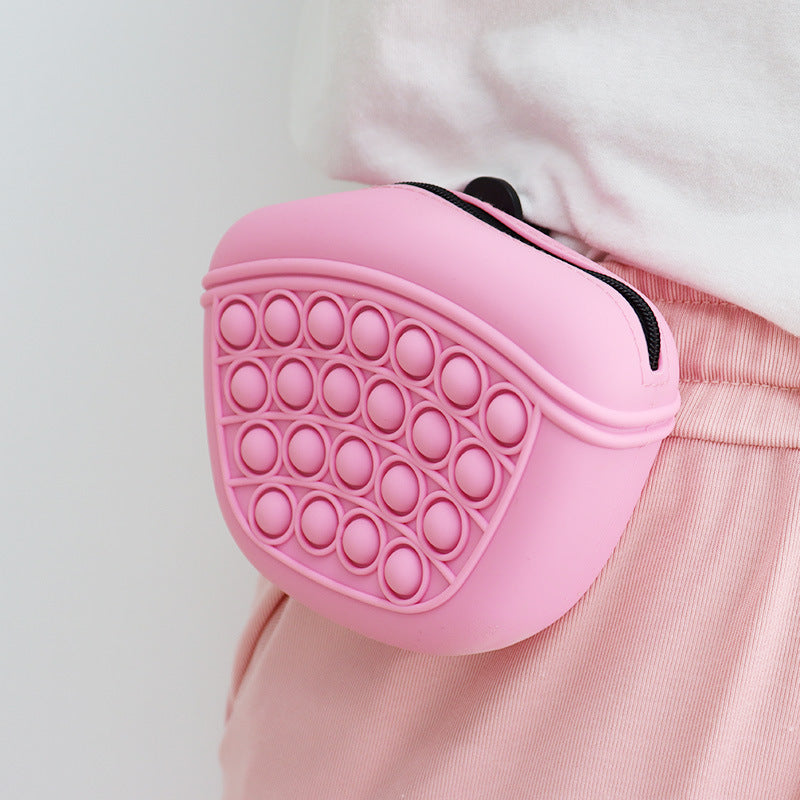 Pink silicone dog treat pouch with pop-bubble front, for waist training rewards