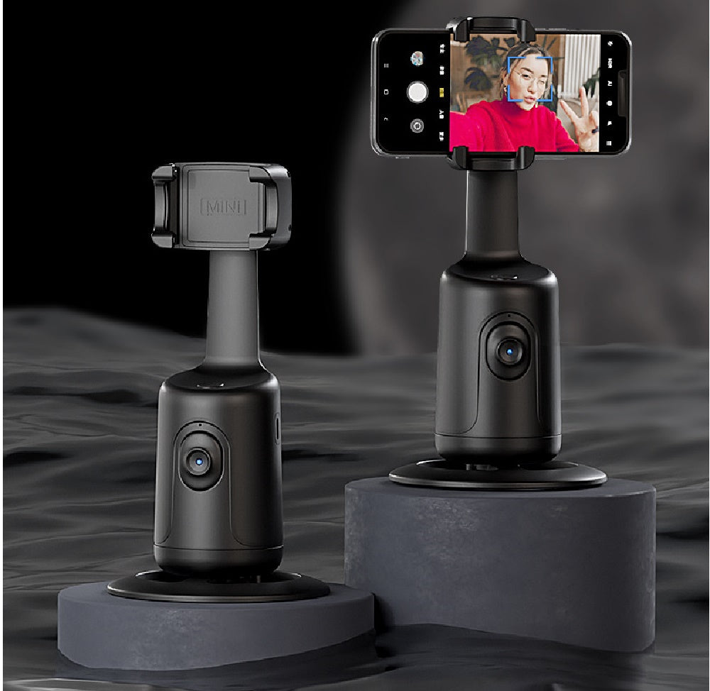 Auto tracking smartphone gimbal with mounted phone on a black stand base