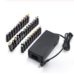 Universal power adapter with multiple DC tips, indicator lights, and power cord