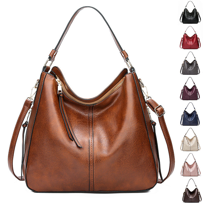 Brown hobo bucket bag with zipper and dual shoulder straps
