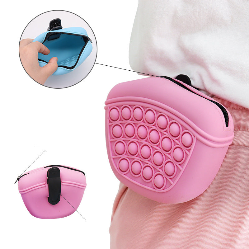 Pink silicone dog treat pouch with black strap; inset shows open zipper pocket