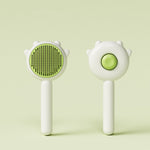 Green and white cat grooming massage brushes with paw-shaped pin heads