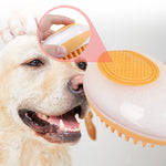 Pet bath brush with orange silicone massage pad and orange bristles under hand