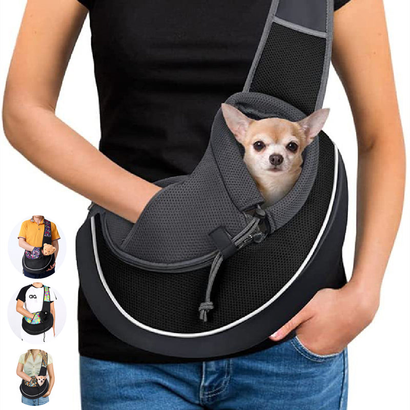 Dark gray pet crossbody bag with mesh strap and front bubble opening, holding a small dog