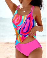 Split high-waist bikini set with colorful swirled tank and bright pink bottoms