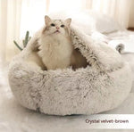 Round plush pet bed with cave opening; beige-gray exterior, cat resting inside