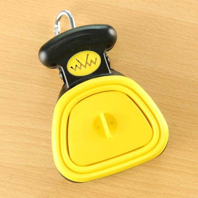 Foldable pet waste scooper with yellow tray, black handle, and keyring loop
