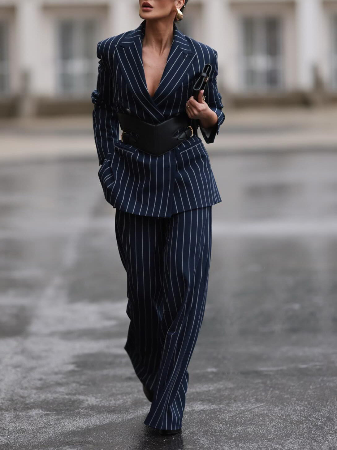 Navy pinstripe blazer and high-waist wide-leg pants with black belt, front view