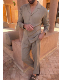 Gray long-sleeve lapel shirt and slim trousers set, button front with V neckline.