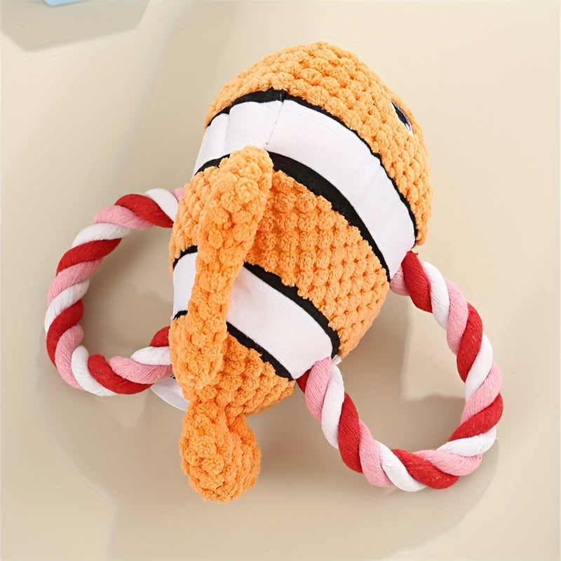 Orange turtle-shaped plush dog chew toy with rope limbs and white stripe