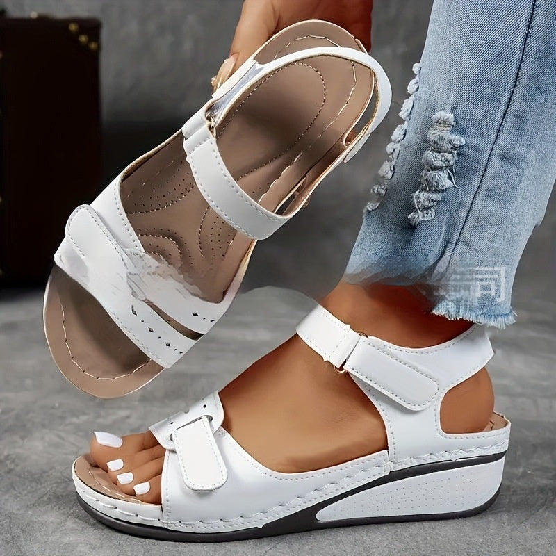 Velcro sandals with thick sole, white upper, open toe and ankle strap