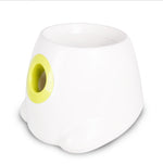 White dog ball launcher with lime-green chute ring and top bowl opening