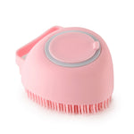 Pink silicone pet bath massage brush with round pad and short rubber bristles