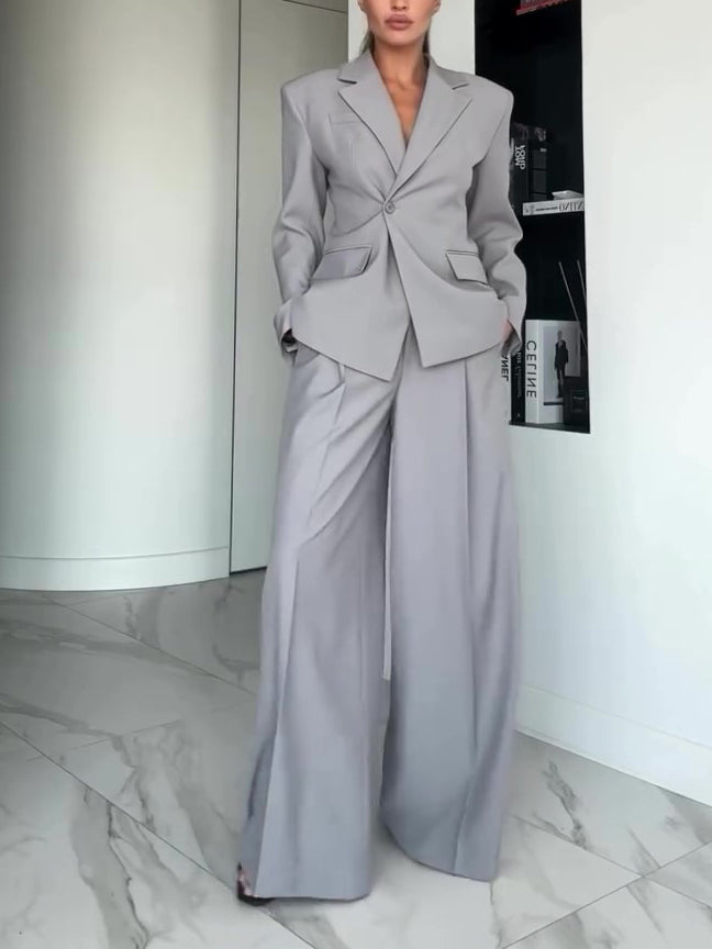 Light gray blazer and wide-leg pants suit with notch lapels, full-length view