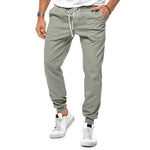 Men's drawstring ankle-cuff sports trousers, light green, loose tapered fit