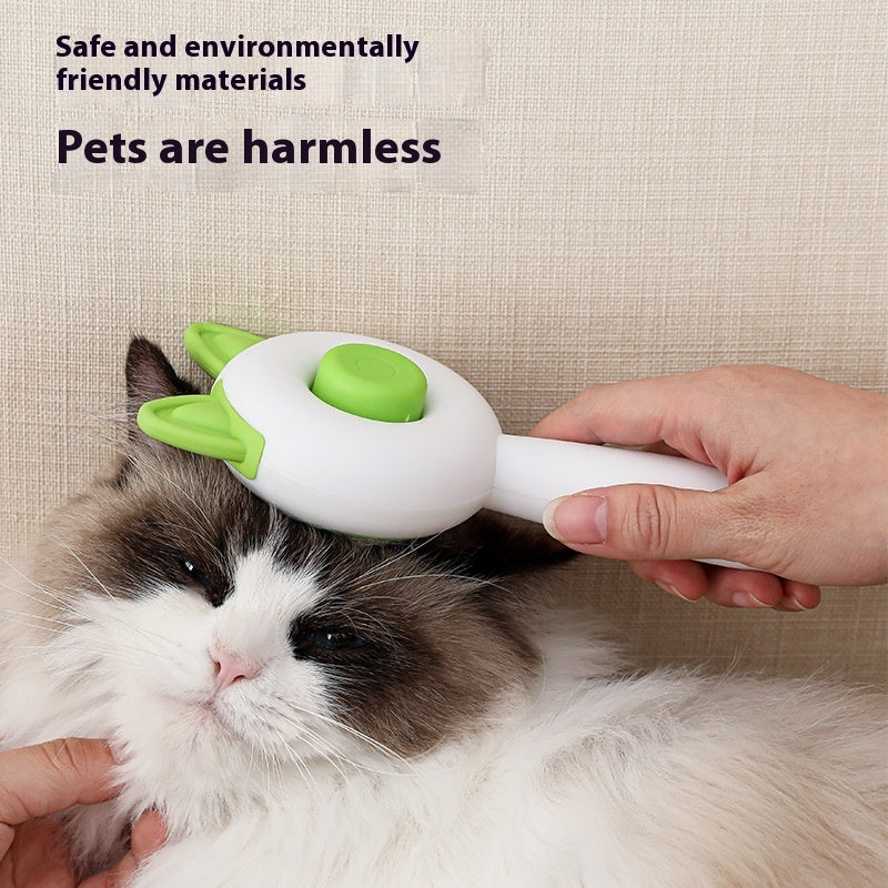 Self-cleaning pet brush with green button and cat-ear head, being used on a cat