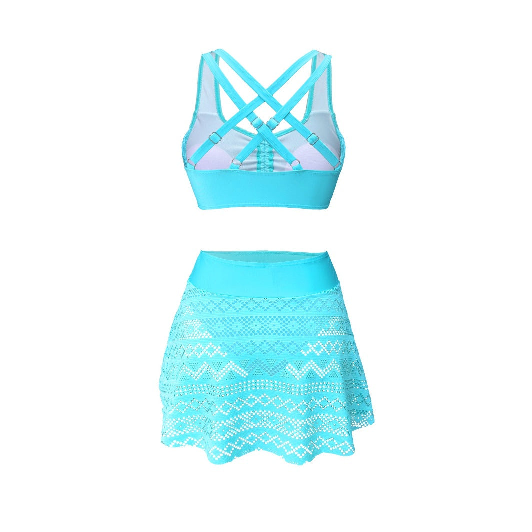 Turquoise crochet bikini top with crisscross straps and matching ruffle mini skirt