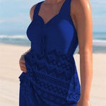 Navy blue lace one-piece swimsuit with padded cups, tie-front detail, and patterned lace skirt