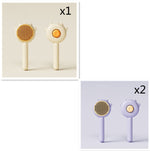 Pet grooming massage comb set with orange and purple round bristle brushes on white handles