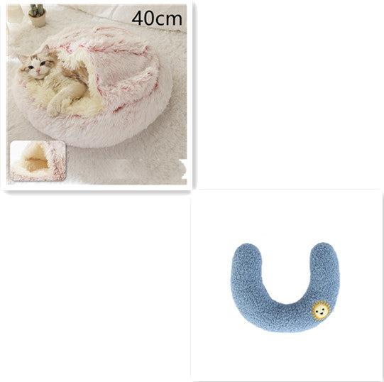 Half-moon plush bolster with blue fabric and small smiley patch