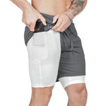 Men's dark gray two-layer compression sports shorts with front pouch pocket and drawstring waist