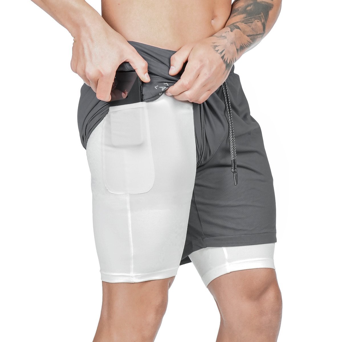 Men's dark gray two-layer compression sports shorts with front pouch pocket and drawstring waist