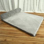 Pet dog bed with grey cord bolster and grey padded base