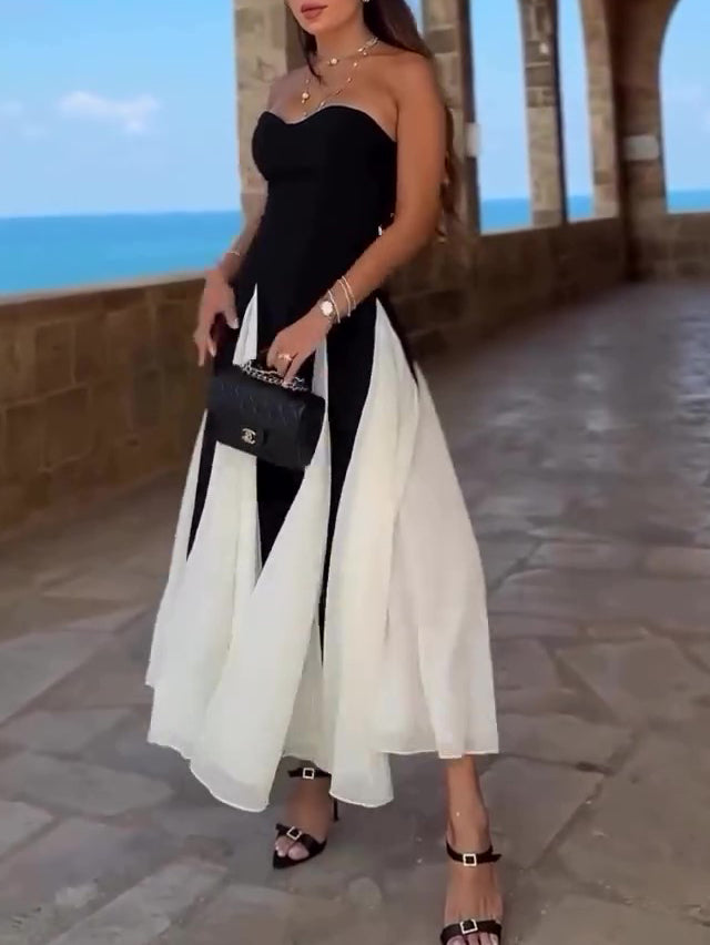 Black strapless maxi dress with white paneled skirt and fitted bodice