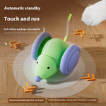 Green cat toy mouse with large purple wheels, soft rounded body and upright antenna
