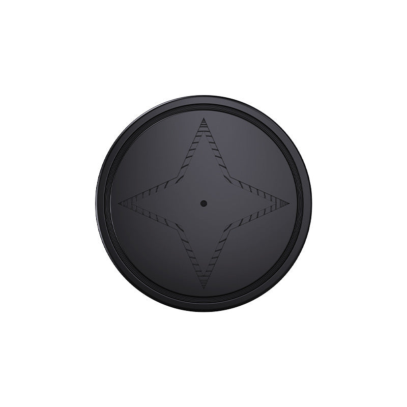 Mini GPS tracker with strong magnet, centered front star emblem on black round housing