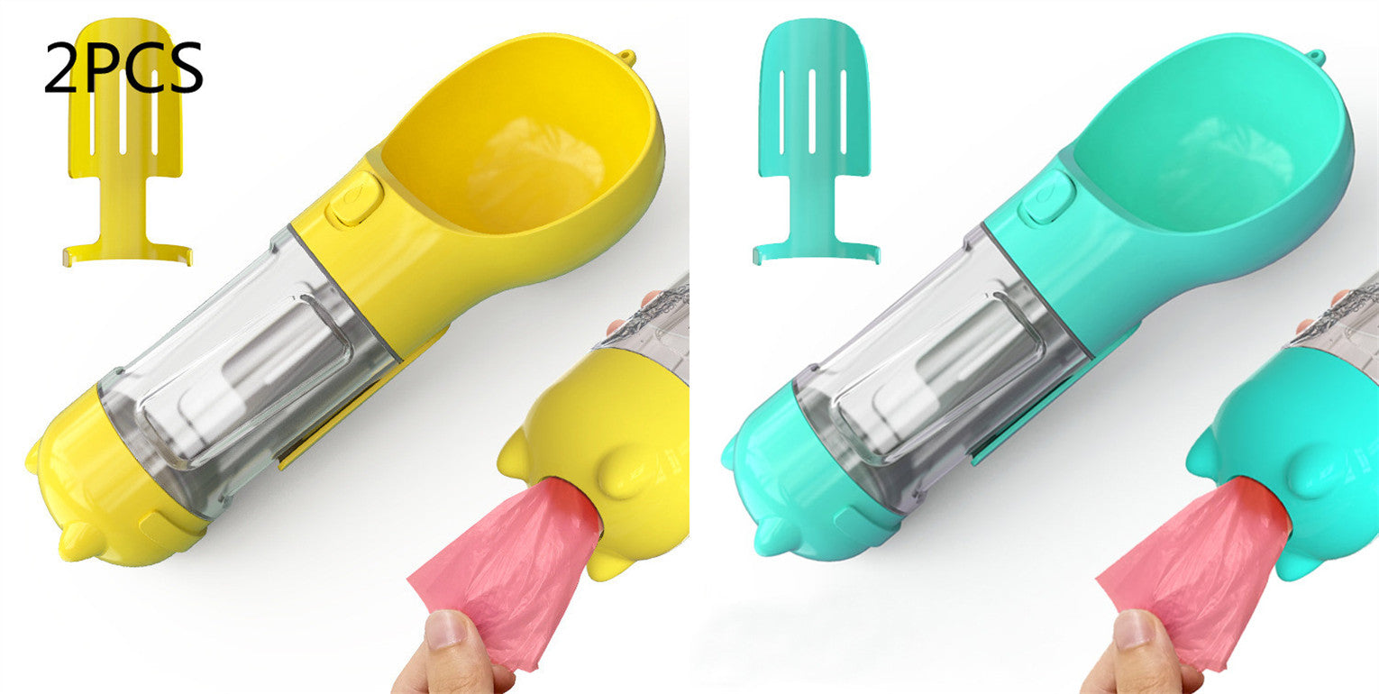 Portable pet water bottle feeder with yellow and teal bowls, clear bottle, includes pink waste bag