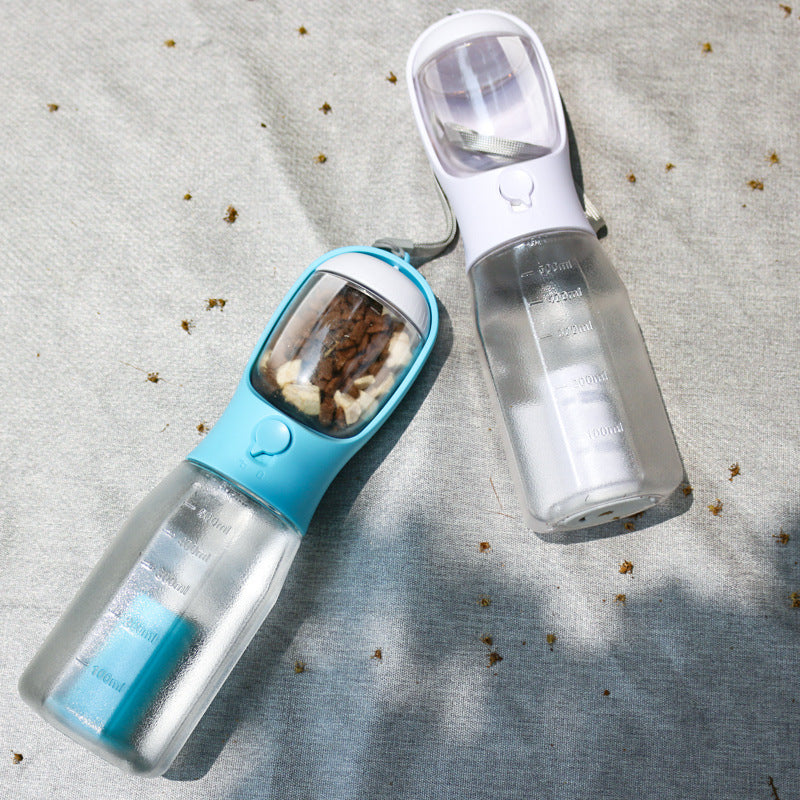 Portable dog water bottle set: blue and white units with cup lids on a surface
