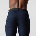 Navy slim-fit trousers back view with elastic waistband and side pockets