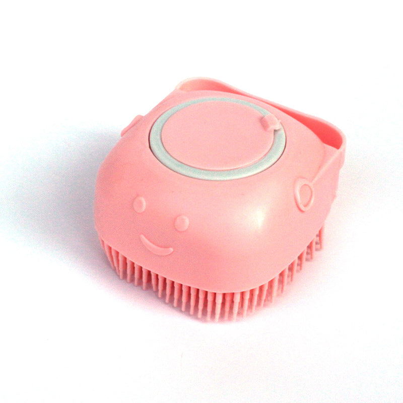 Pink silicone pet bath massage brush with circular pad and short rubber bristles